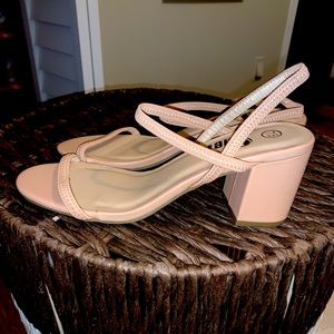 Size 7.5 Pump high heels, with stretchy straps, nude colored. NEVER WORN!!